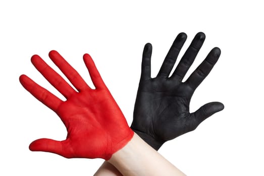 a red and a black painted hand, isolated