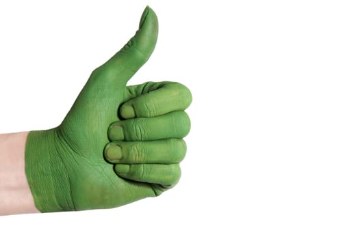 a green painted hand shows one thumb up symbolizing something good till exempel environment and nature