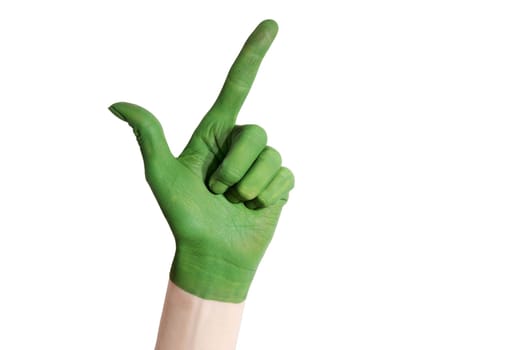 a green painted hand showing an okay gesture