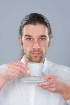man is drinking coffee