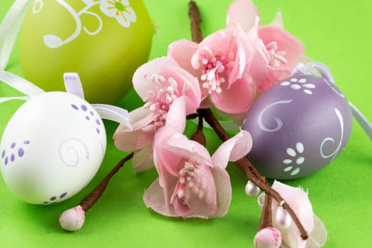 Easter eggs and a branch of peach tree