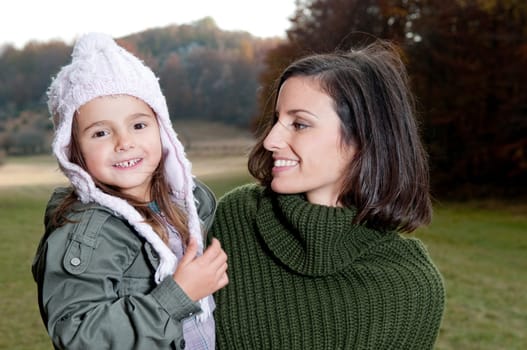 Mother and daughter in nature