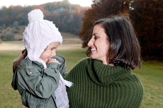 Mother and daughter in nature