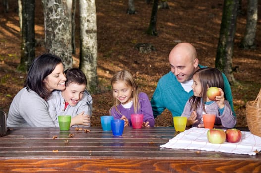 Happy family having fun outside