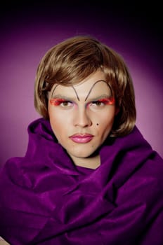Man with drag makeup wearing wig