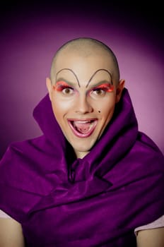 Man portrait with drag makup. Surprised expression.