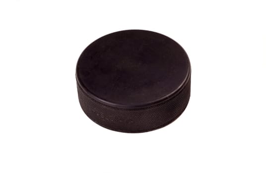 Hockey puck isolated on white