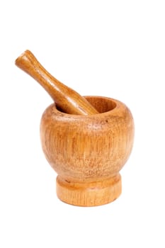Wooden mortar with a pestle isolated on white