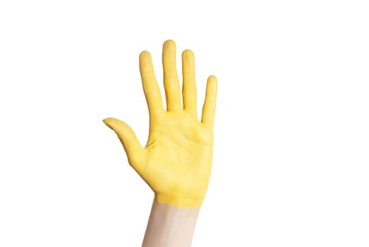a yellow hand in voting gesture or as a symbol of luck and happiness