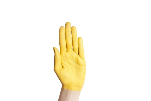 a yellow hand hold up in the air, isolated