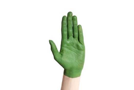 a green painted hand symbolizing nature and environment