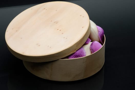 Wooden soap box and rose