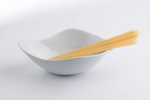 White china bowl and spaghetti pasta