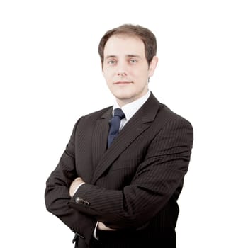 Caucasian young nostalgic businessman looking at camera with arms folded, portrait