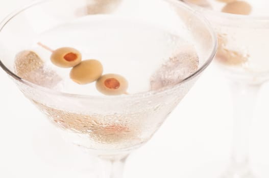 Dry Martini Cocktail made from Gin and a dash of Vermouth garnished with stuffed olives