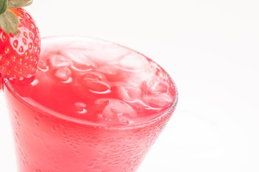 Strawberry made of starwberry juice, gin , lemon juice and topped up with soda and garnished with a fresh strawberry