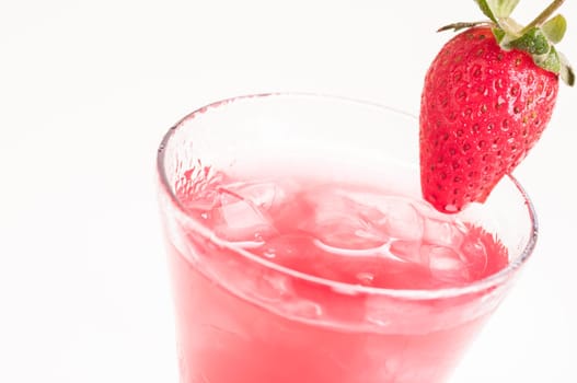 Strawberry made of starwberry juice, gin , lemon juice and topped up with soda and garnished with a fresh strawberry