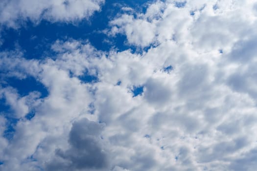 Blue Sky with Lots of White Clouds: Background for Replacement or Inspiring Ideas.