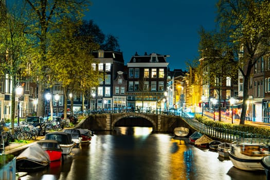 Captivating Night in Amsterdam: A Mesmerizing Long Exposure Photo of Amsterdam's Nighttime Canals.