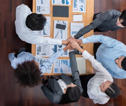 Top view panoramic banner hand stack by office worker show solidarity teamwork and trust in workplace. Diverse businesspeople unite for success with synergy and collaboration by hand stacking. Concord