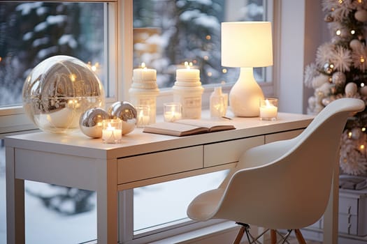 christmas decorations and candles on a desk in front of a window with a white chair next to the windowsill
