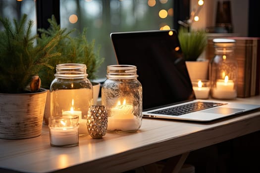 some candles on a table with a laptop in front of it and a plant next to the candle is lit