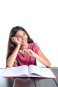Schoolgirl smiling and looking up. Isolated on white.