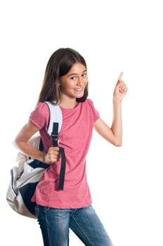 Portrait of a smiling schoolgirl pointing up at something. Isolated on white.