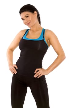 pretty brunette wearing sport outfit on white background
