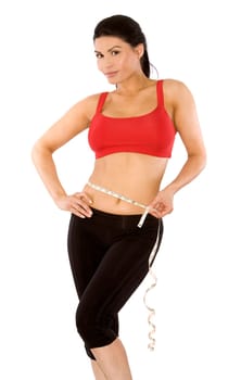 pretty brunette wearing sport outfit on white background