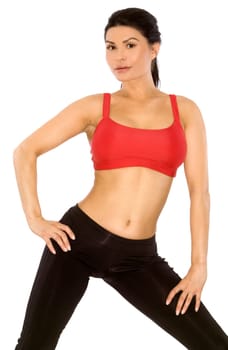 pretty brunette wearing sport outfit on white background