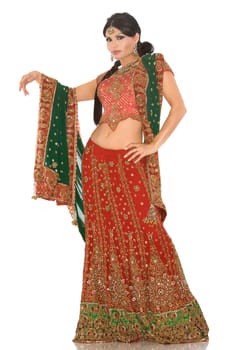 beautiful indian woman wearing bridal outfit on white