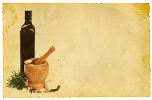 Mortar with a pestle and olive oil on old paper background.