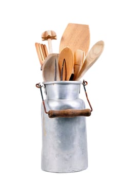 Milk jug with wooden spoon