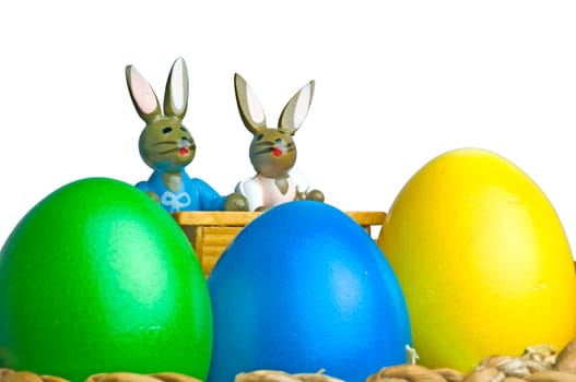 Easter bunnies at school desk with Easter eggs