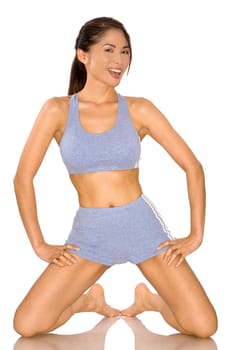 pretty asian woman wearing sport outfit on white
