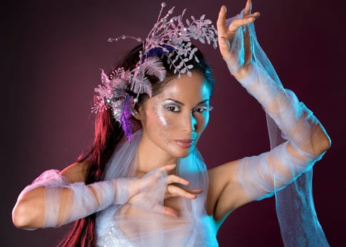 pretty brunette woman wearing white and silver accessories