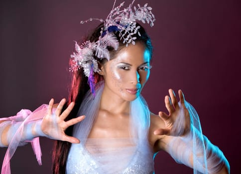 pretty brunette woman wearing white and silver accessories