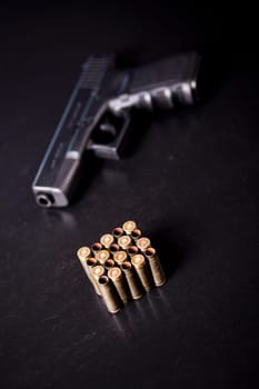 Ammunition and automatic handgun