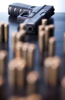 Ammunition and automatic handgun