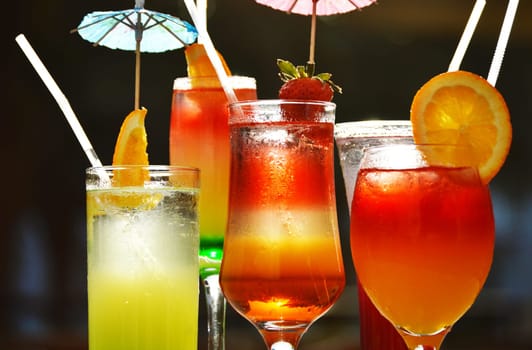 Composition with five glasses of drinks