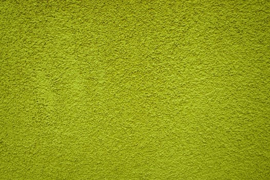 Uneven background: yellow plaster