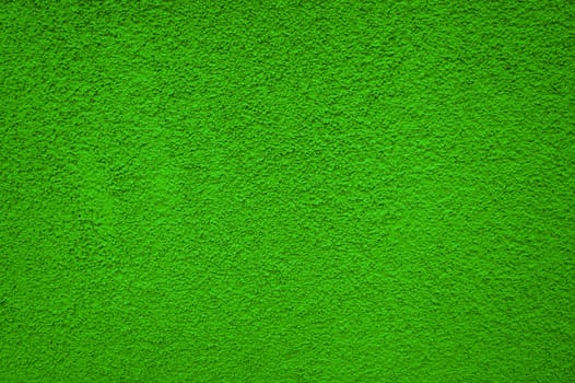 Uneven background: Green plaster