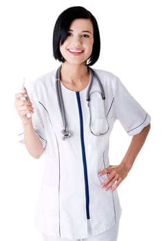 Female doctor or nurse holding digital thermometer, isolated on white