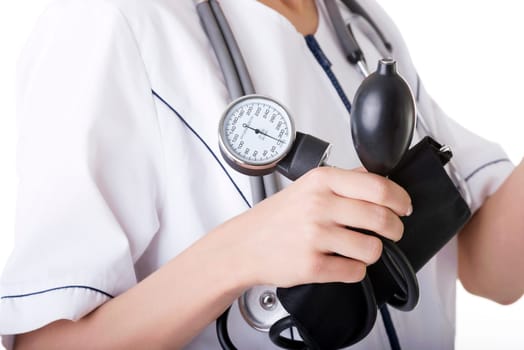 Woman doctor with blood pressure gauge , isolated on white
