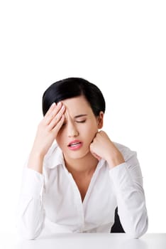 Businesswoman with big problem , headache or depression