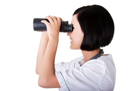Looking in the futere of health care. Female doctor or nurse looking through binoculars.