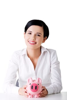 Happy business woman with her savings, isolated