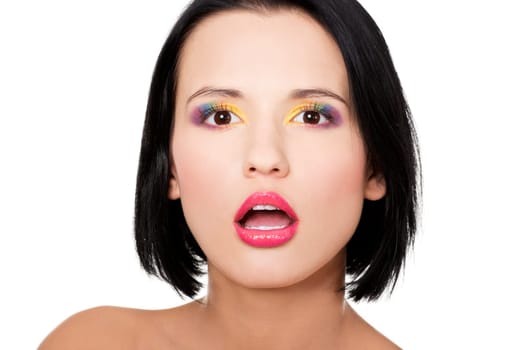 Beautiful woman with rainbow eye make up, isolated on white