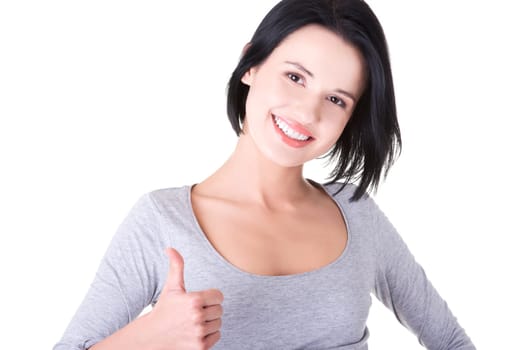 Beautiful young woman in casual clothes gesturing thumbs up.